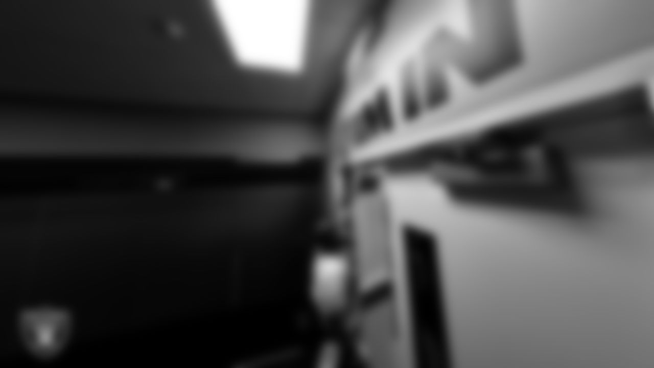 Las Vegas Raiders guard Alex Cappa (65) walks out to the field for practice at Intermountain Health Performance Center.