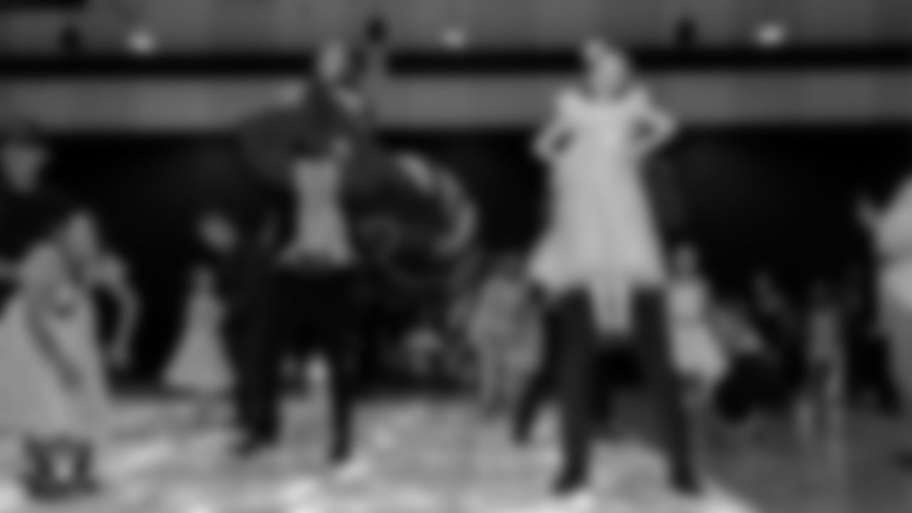 Attendees learn a dance during the Valentine's Day Dance at The Studio.