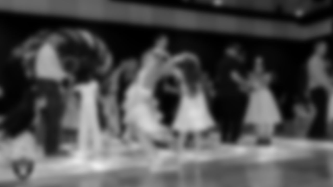 Attendees learn a dance during the Valentine's Day Dance at The Studio.