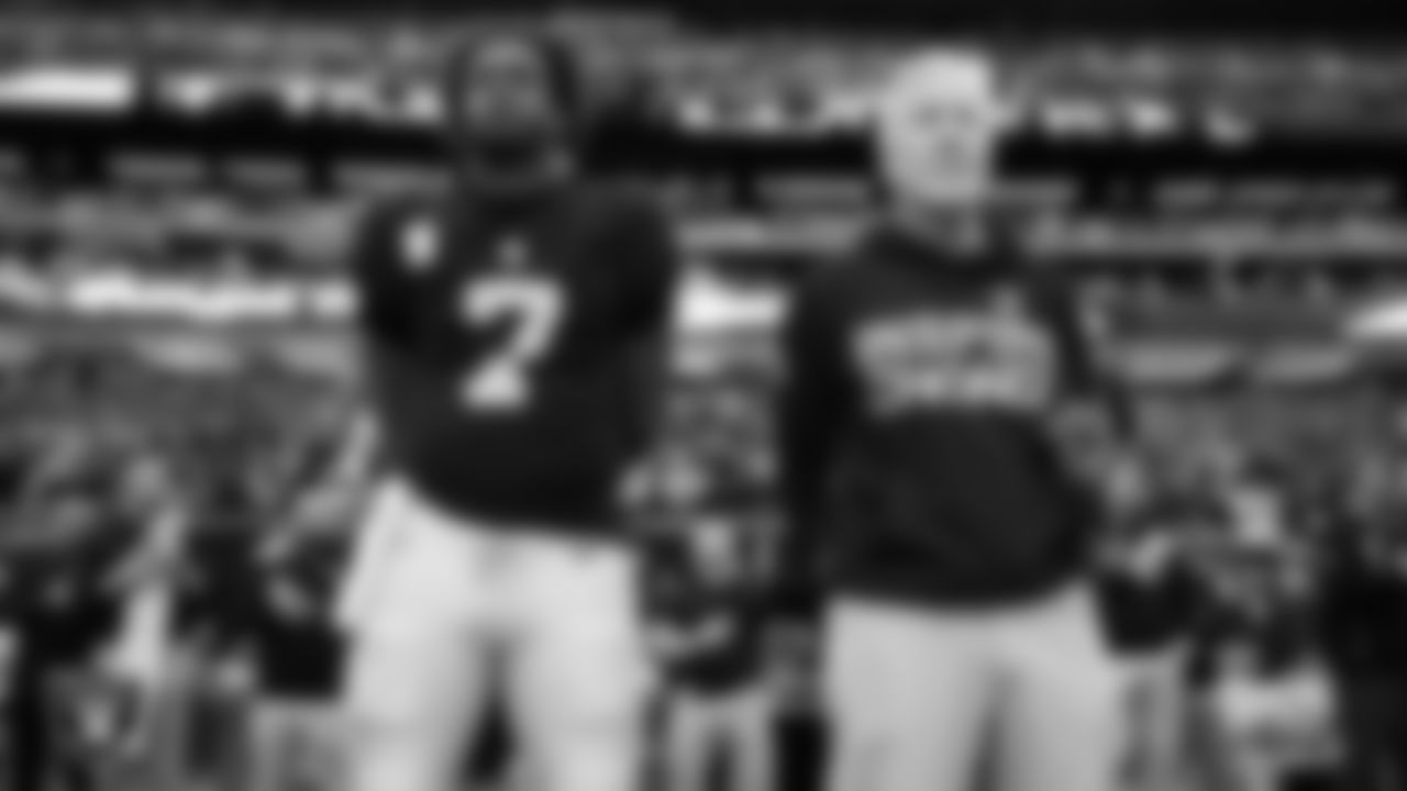 Las Vegas Raiders quarterback Geno Smith (7) and Head Coach Pete Carroll during the national anthem before the regular season home game against the New York Giants at Allegiant Stadium.