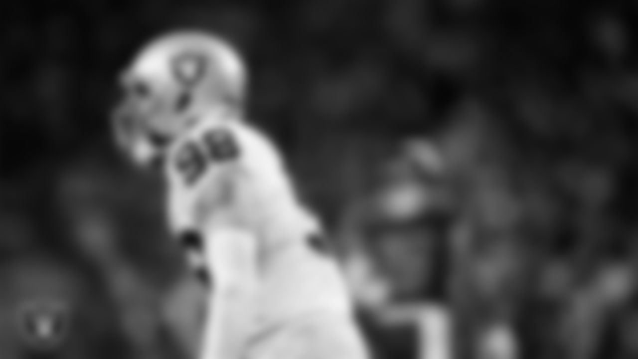 Las Vegas Raiders defensive end Maxx Crosby (98) celebrates after making a tackle during the regular season away game against the Houston Texans at NRG Stadium.