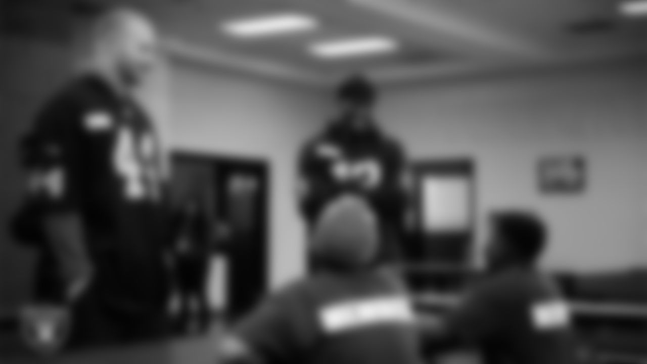 Las Vegas Raiders linebacker Tommy Eichenberg (44) and wide receiver Phillip Dorsett II (13) meet with members of the Boys and Girls Club at the Lied Memorial Boys & Girls Clubs of Southern Nevada.