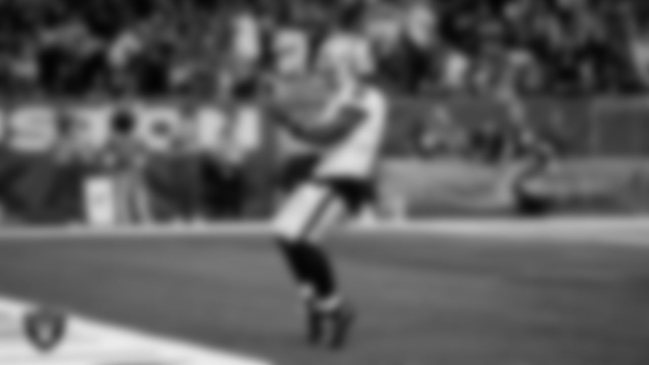 Las Vegas Raiders running back Ashton Jeanty (2) celebrates after making a 60-yard touchdown catch during the regular season away game against the Houston Texans at NRG Stadium.