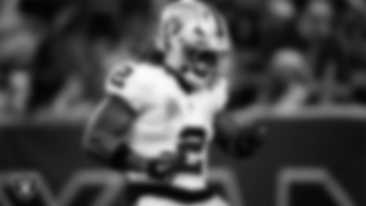 Las Vegas Raiders running back Ashton Jeanty (2) celebrates after making a 60-yard touchdown catch during the regular season away game against the Houston Texans at NRG Stadium.