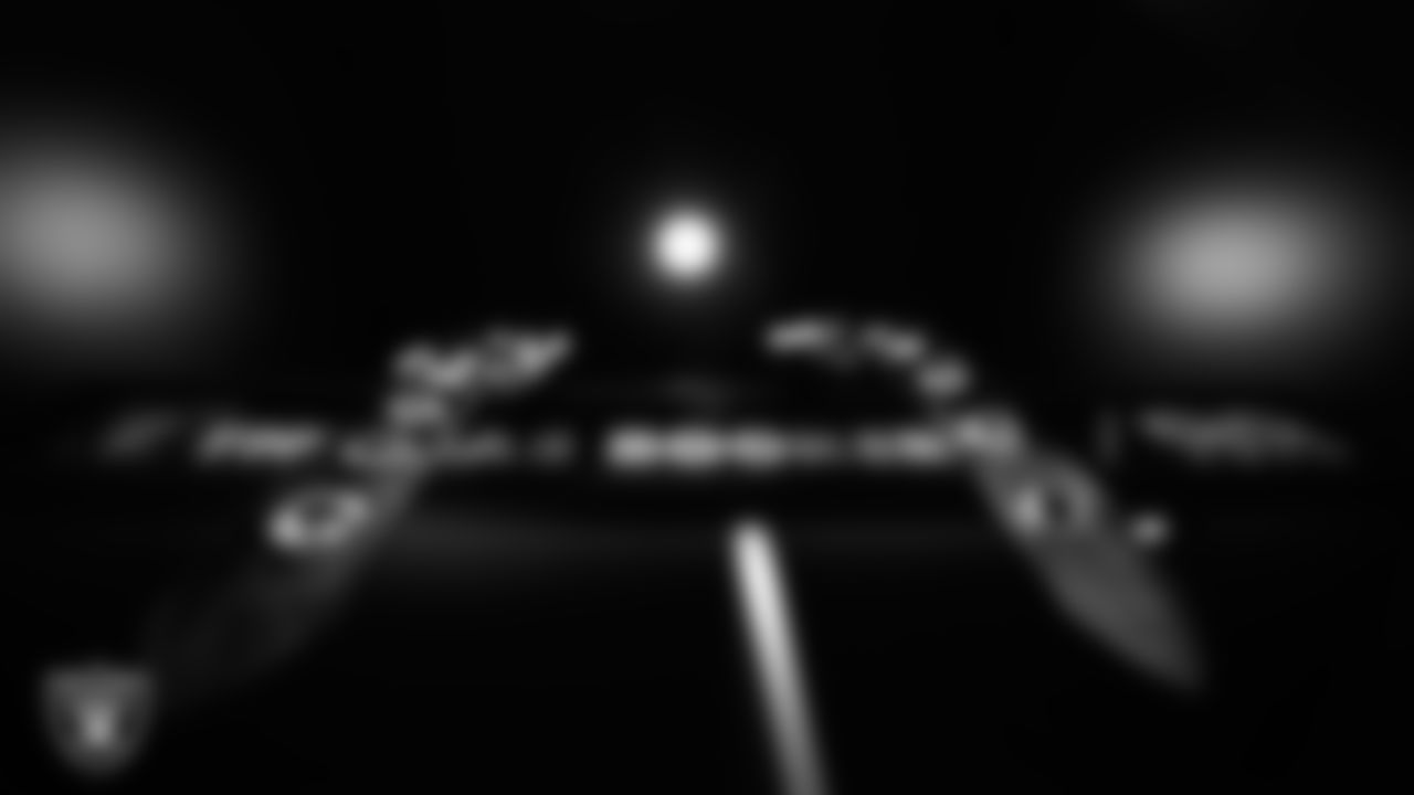 Las Vegas Raiders defensive tackle Thomas Booker IV's (99) pad straps in the locker room prior to the Raiders' arrival for their regular season home game against the Denver Broncos at Allegiant Stadium.