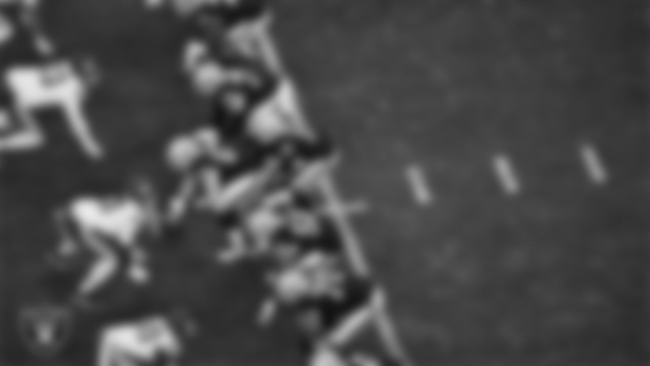 The Las Vegas Raiders offense lines up before the snap during the regular season home game against the Kansas City Chiefs at Allegiant Stadium.