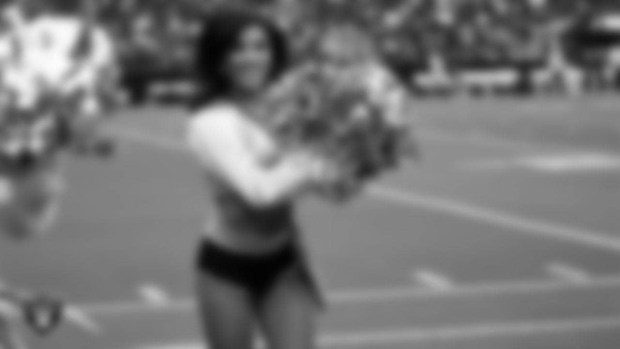 Raiderette Tatiana performs on the sidelines during a 2025 Training Camp mock game at Allegiant Stadium.