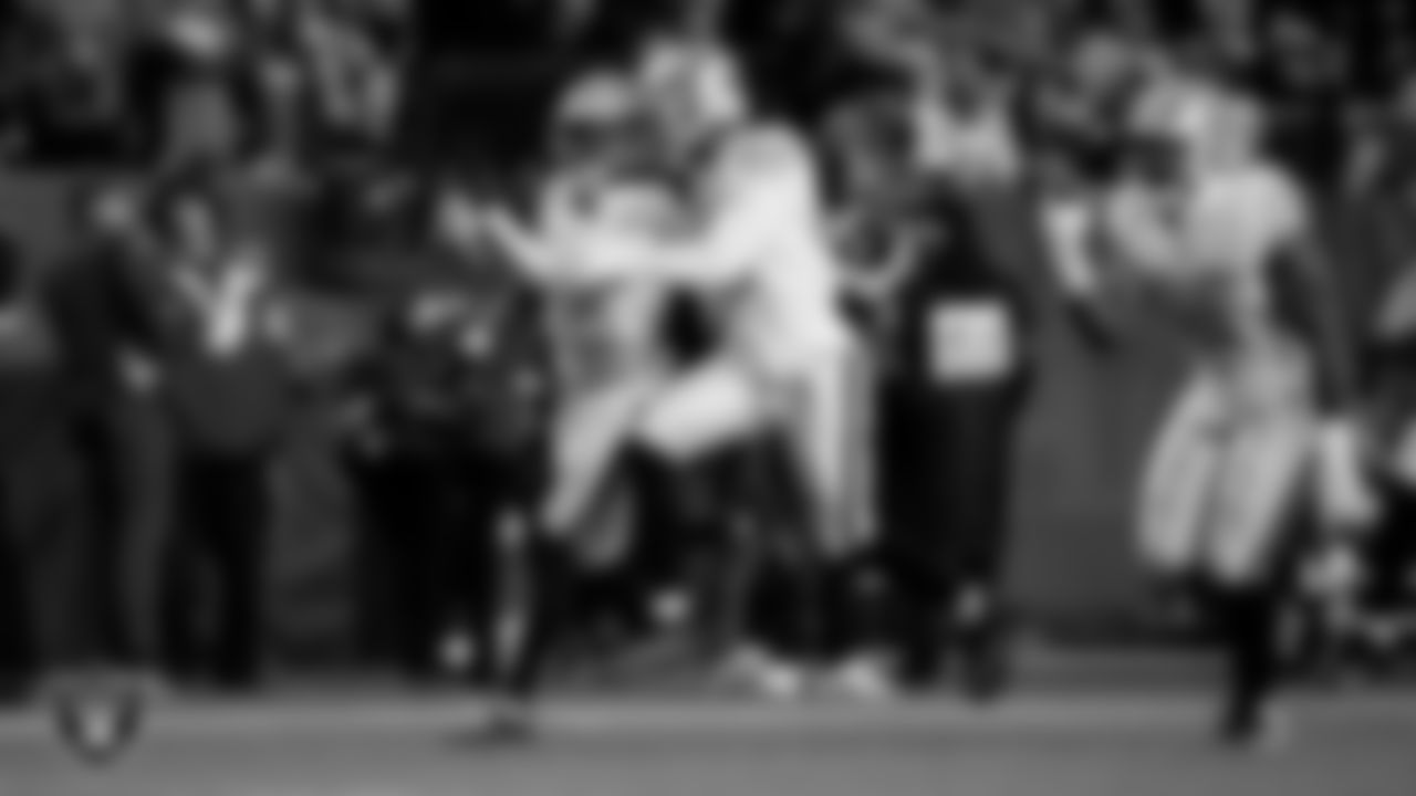 Las Vegas Raiders cornerback Kyu Blu Kelly (36) celebrates with teammates after intercepting a pass during the regular season away game against the Denver Broncos at Empower Field at Mile High.