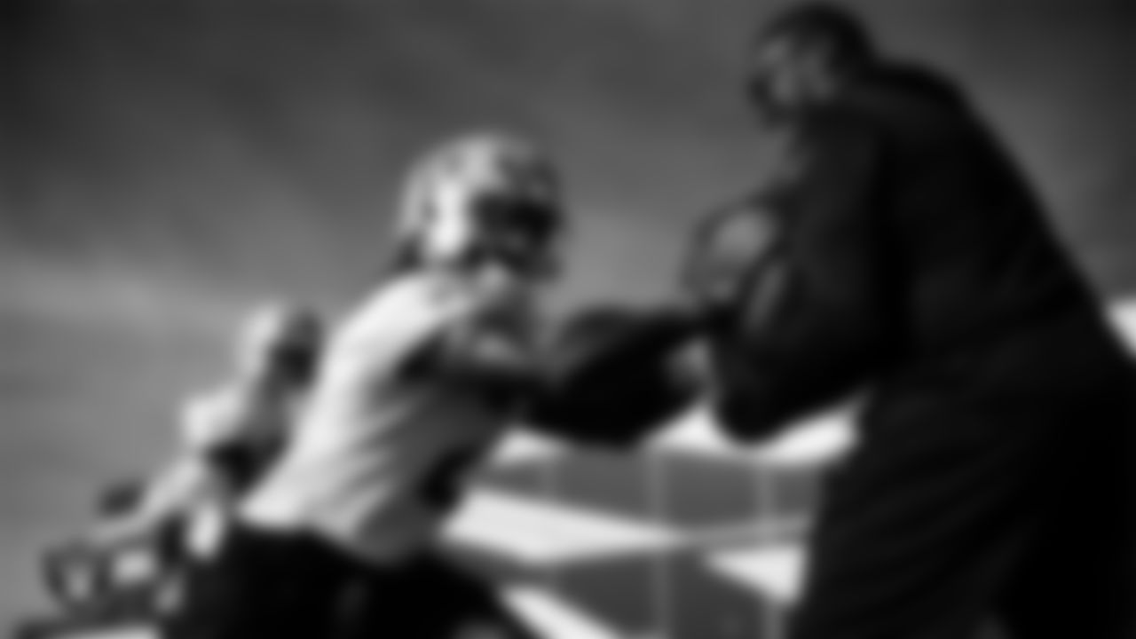 Las Vegas Raiders running back Ashton Jeanty (2) and running backs coach Deland McCullough during practice at Intermountain Health Performance Center.