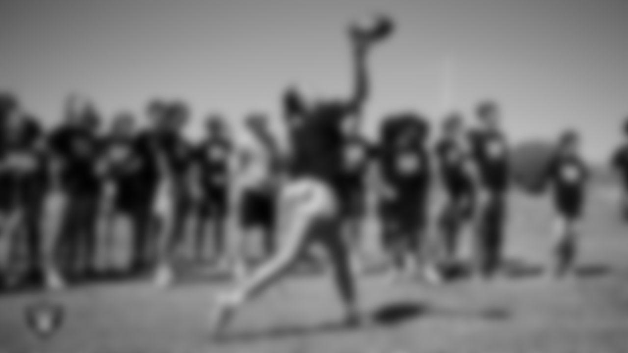 An athlete takes part in a drill after a partnership announcement between the Las Vegas Raiders and Clark County School District as a Silver and Black Flag Football league at the middle school level at Sig Rogich Middle School.