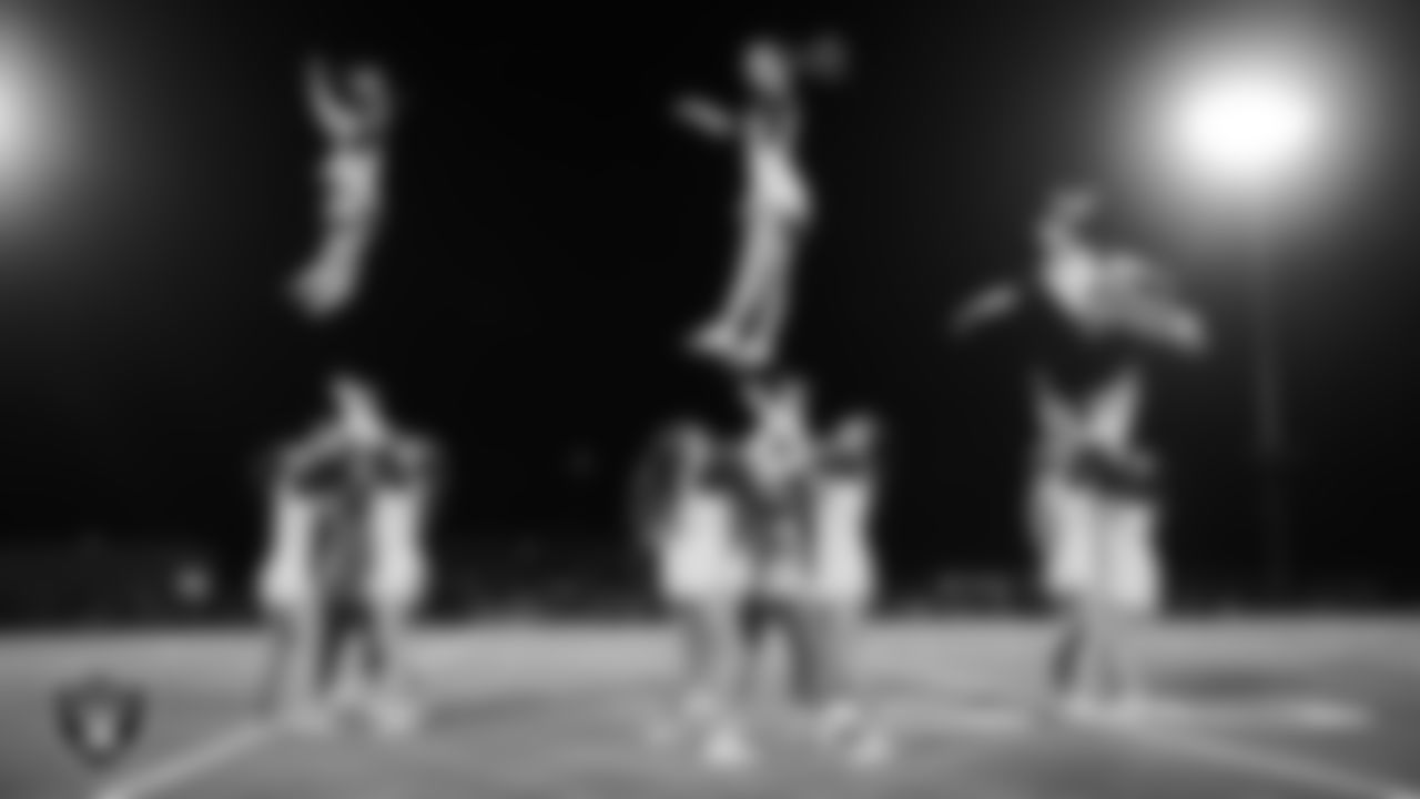 The Moapa Valley High School cheer team performs during halftime of the Las Vegas Raiders' Football Showcase game at Moapa Valley High School.