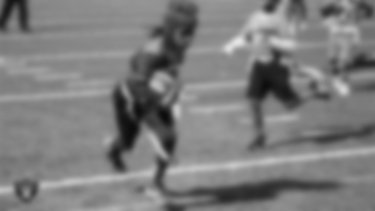 Athletes from the East Division and West Division of the City of Las Vegas Silver and Black Youth Flag Football League compete in the championship game at All American Park.