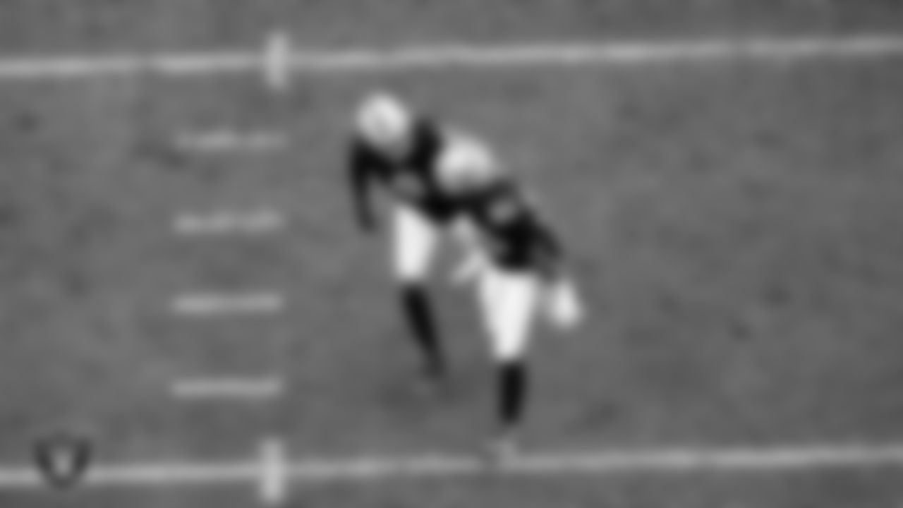 Las Vegas Raiders defensive end Tyree Wilson (9) and defensive tackle Jonah Laulu (96) during the regular season home game against the Tennessee Titans at Allegiant Stadium.