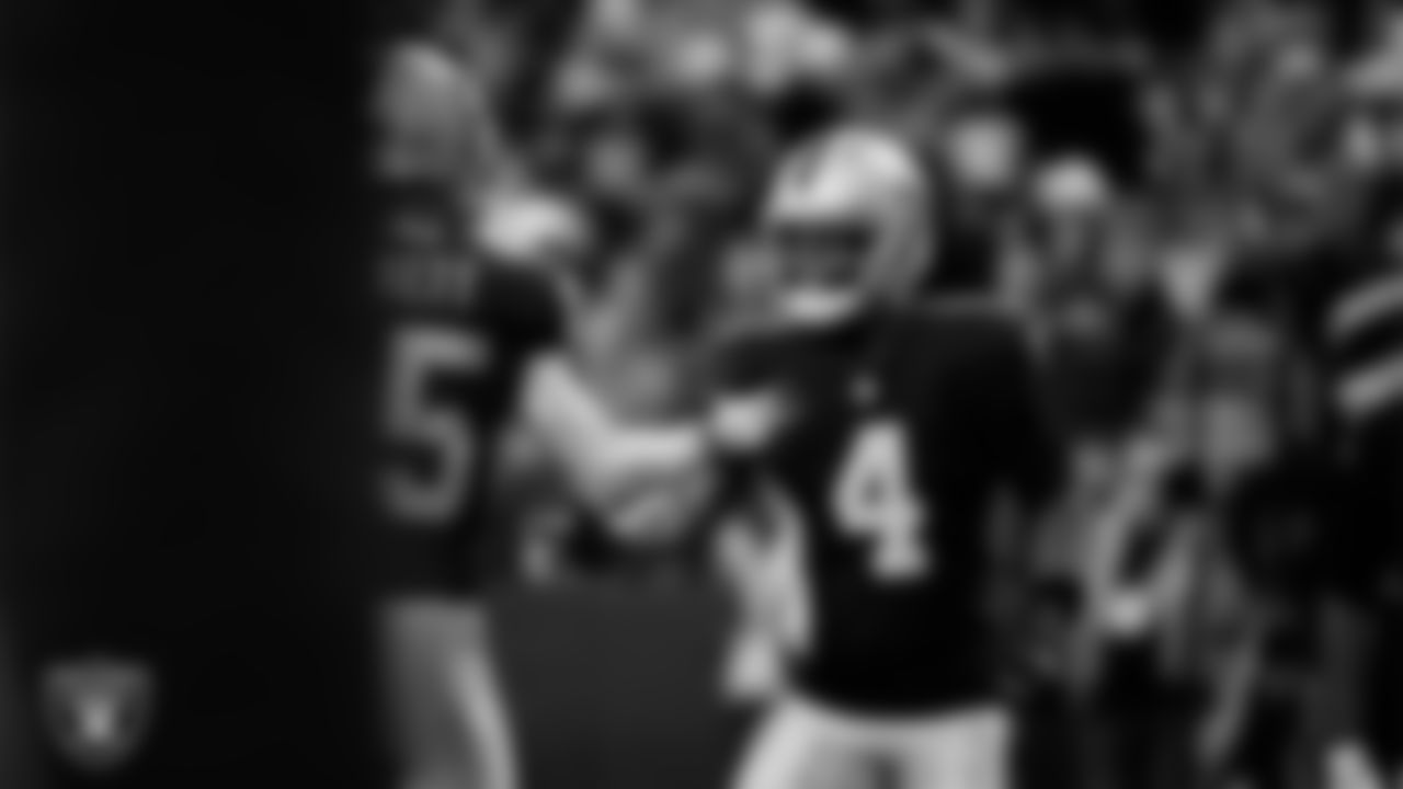 Las Vegas Raiders wide receiver Shedrick Jackson (4) celebrates with quarterback Kenny Pickett (15) after making a 25-yard touchdown catch during the regular season home game against the Denver Broncos at Allegiant Stadium.