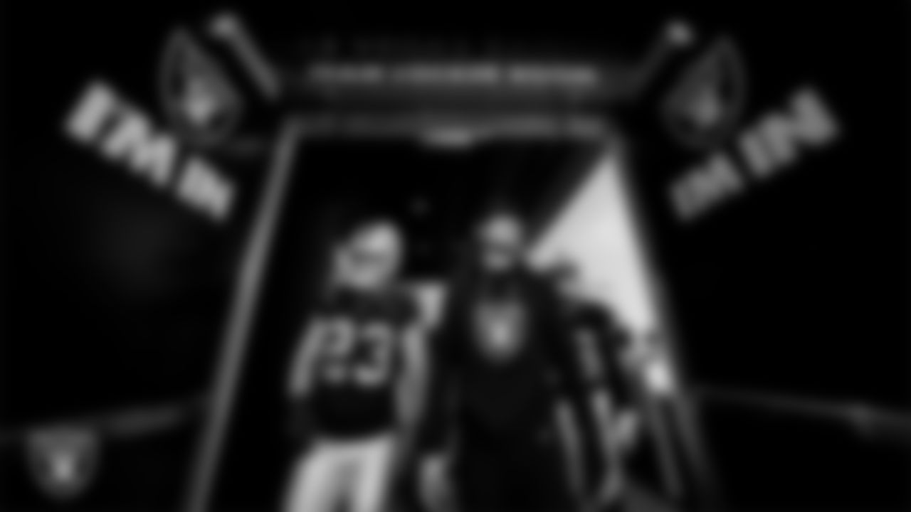 Las Vegas Raiders running back Dylan Laube (23) and wide receiver Alex Bachman (81) exit the locker room before the regular season home game against the Denver Broncos at Allegiant Stadium.