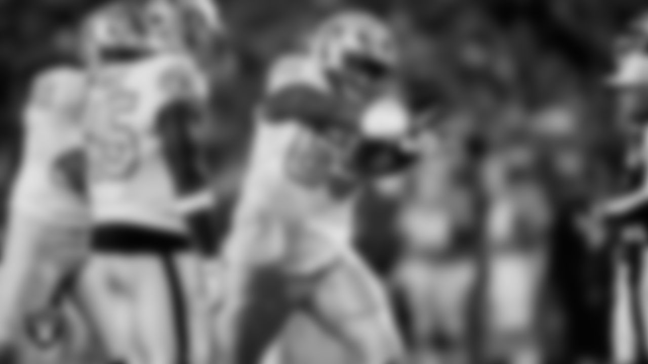 Las Vegas Raiders defensive tackle Adam Butler (69) celebrates after sacking the quarterback during the regular season away game against the Denver Broncos at Empower Field at Mile High.