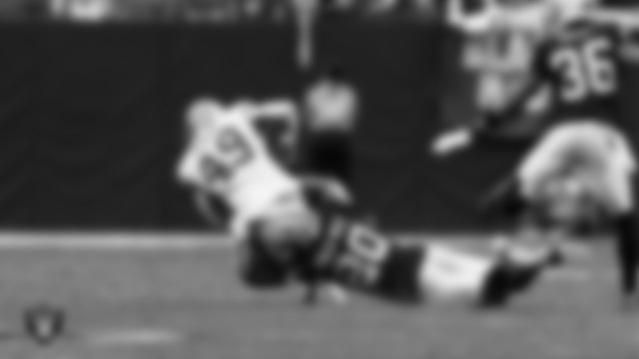 Las Vegas Raiders safety Isaiah Pola-Mao (20) makes a tackle during the preseason home game against the San Francisco 49ers at Allegiant Stadium.