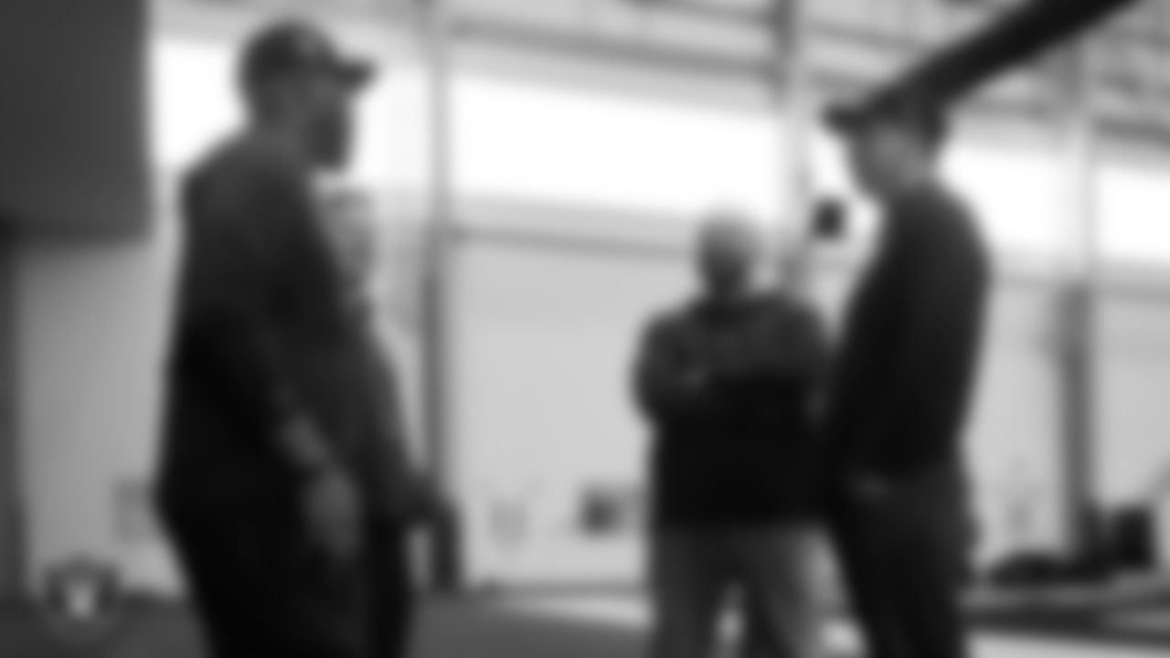 Las Vegas Raiders Head Coach Klint Kubiak with vice president of player personnel Brandon Hunt, senior vice president of football operations and strategy Mark Thewes and assistant general manager Brian Stark on the indoor field at Intermountain Health Performance Center.