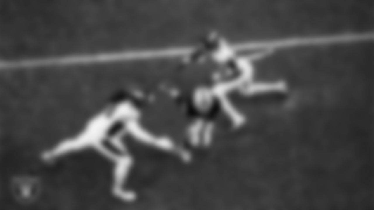 Las Vegas Raiders wide receiver Jakobi Meyers (16) rushes for a 5-yard touchdown during the regular season home game against the Denver Broncos at Allegiant Stadium.
