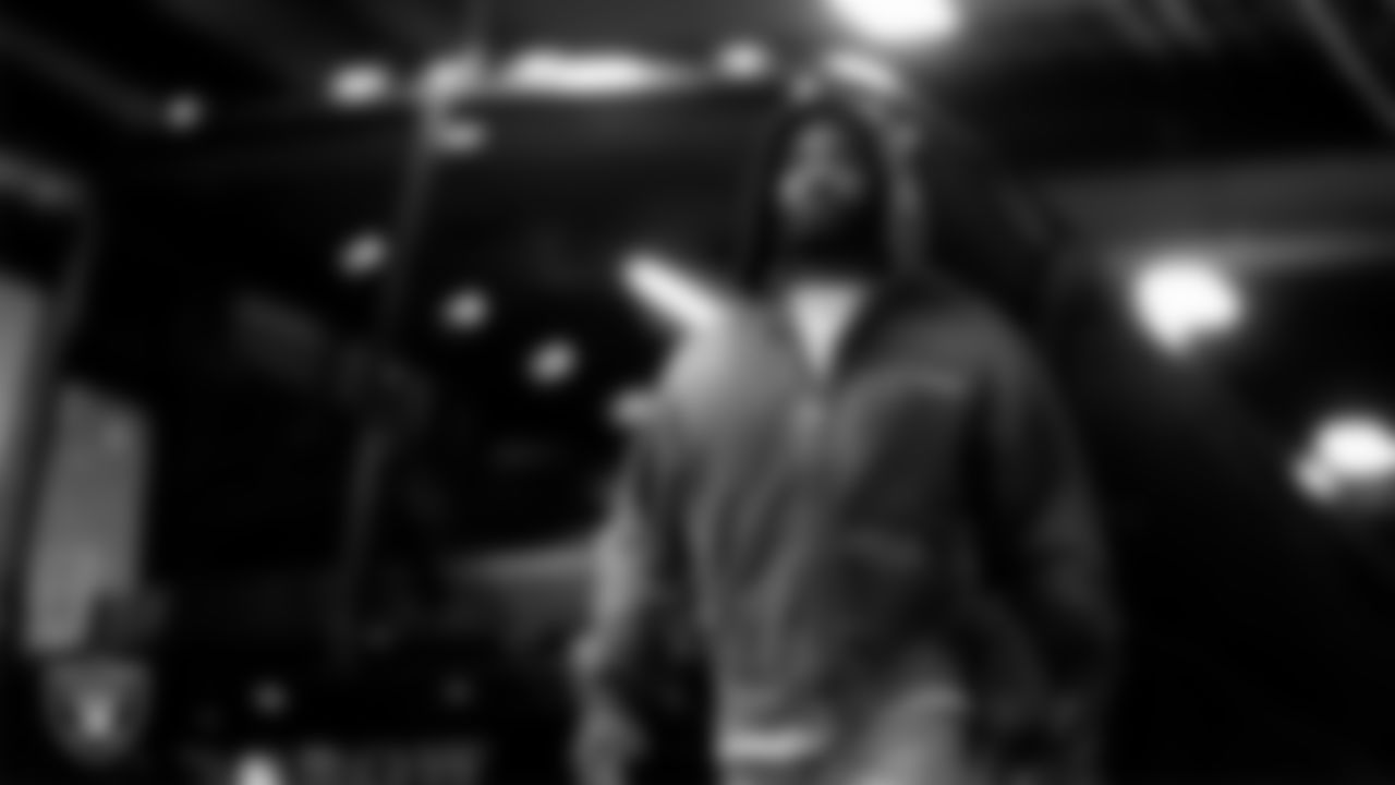 Las Vegas Raiders linebacker Elandon Roberts (52) arrives to the regular season away game against the Denver Broncos at Empower Field at Mile High.