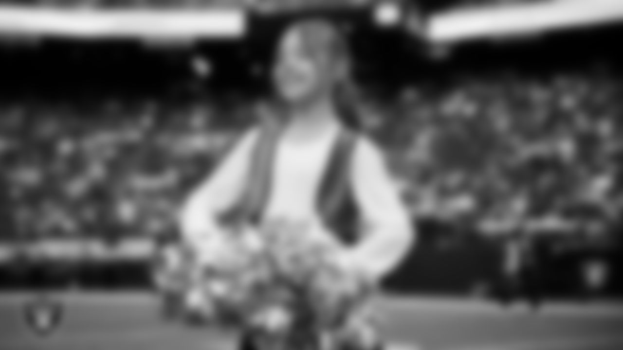 Junior Raiderettes perform on the field before the preseason home game against the San Francisco 49ers at Allegiant Stadium.