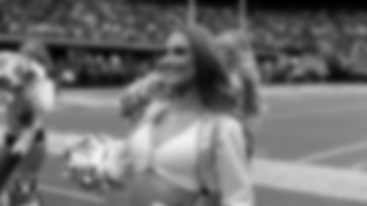 Raiderette Madisyn on the sidelines during the preseason home game against the San Francisco 49ers at Allegiant Stadium.
