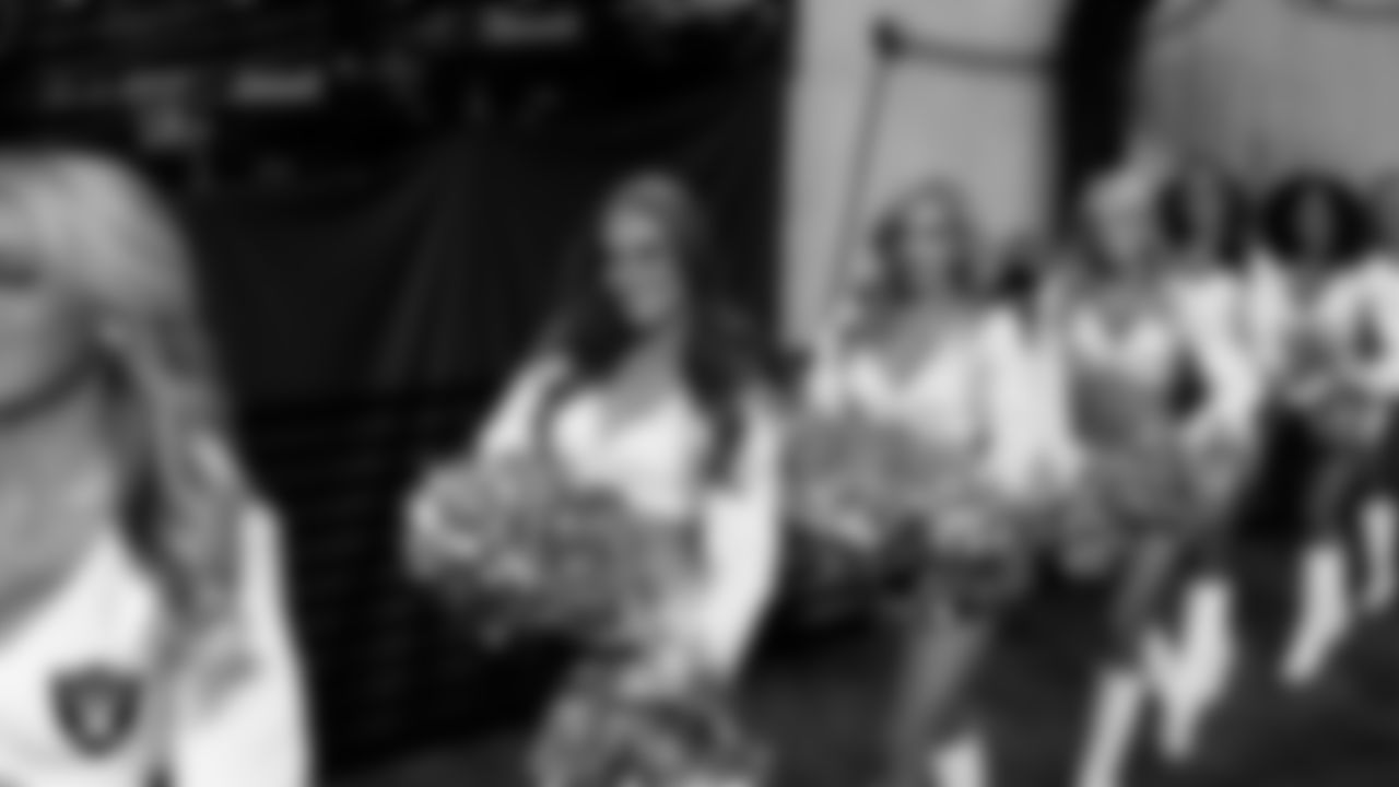 Raiderette Madisyn walks through the tunnel before the regular season home game against the Los Angeles Chargers at Allegiant Stadium.