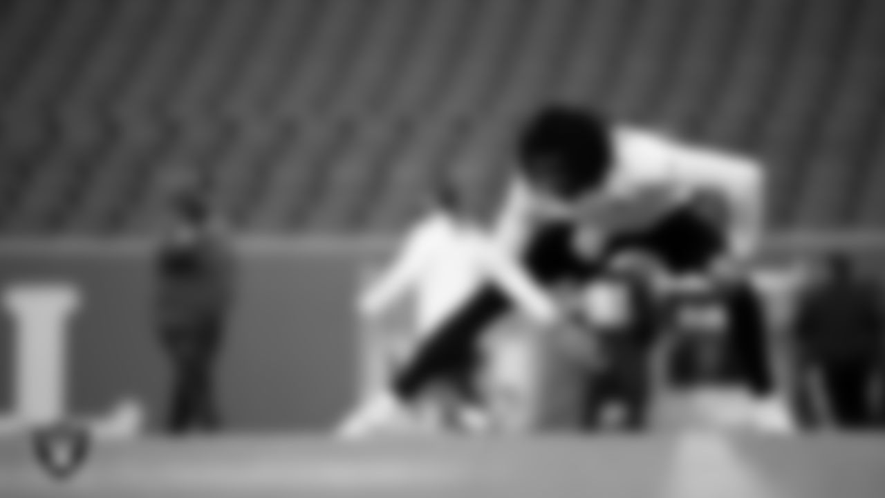 Las Vegas Raiders cornerback Darien Porter (26) warming up before the regular season away game against the Denver Broncos at Empower Field at Mile High.