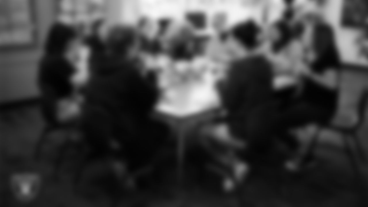 Richard H. Bryan Elementary School teachers enjoy a meal in the teacher's lounge during a Raiders Spirit Day at Richard H. Bryan Elementary School.