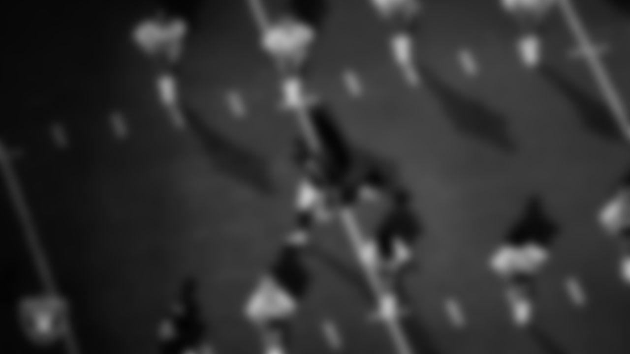 Las Vegas Raiders defensive tackle Thomas Booker IV (99) is introduced onto the field before the regular season home game against the Los Angeles Chargers at Allegiant Stadium,