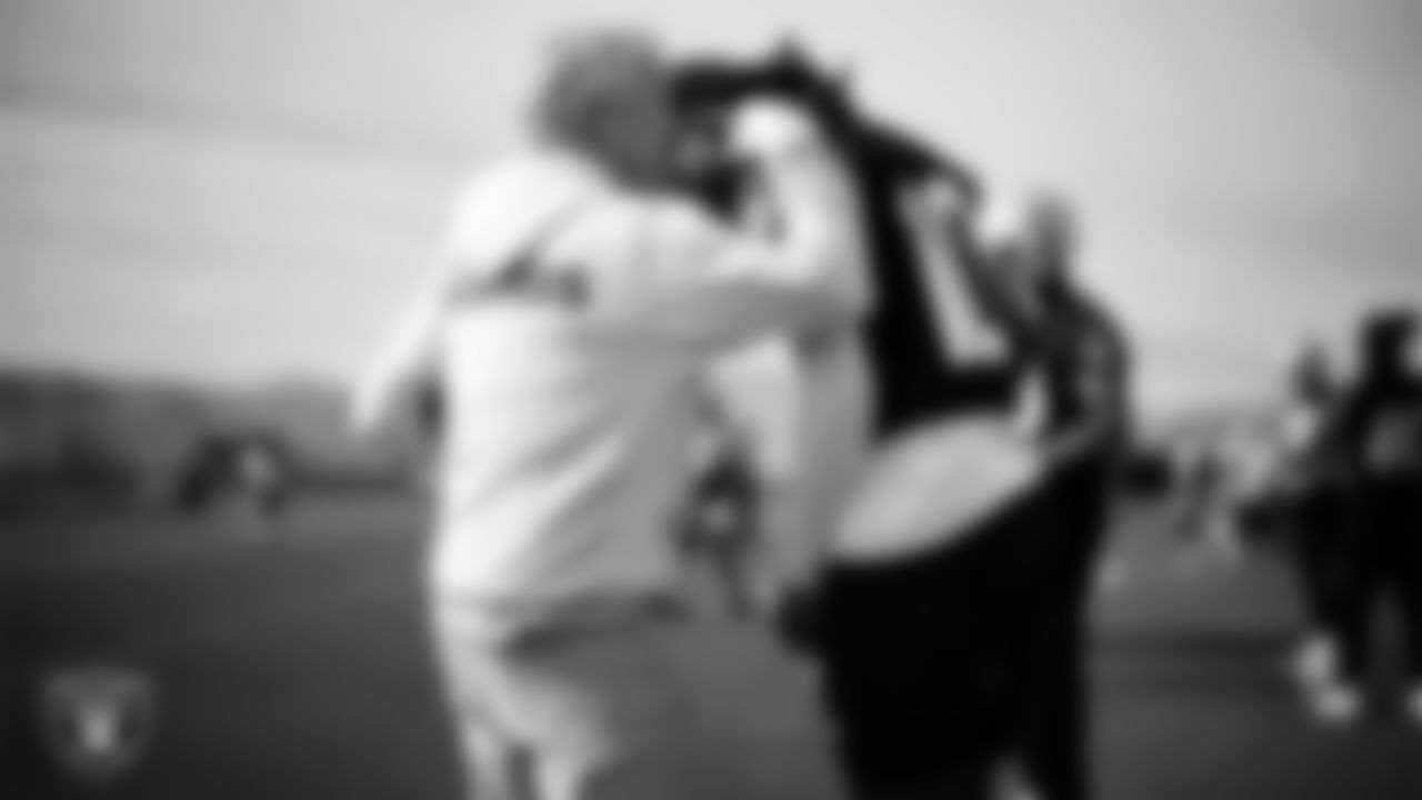 Las Vegas Raiders Head Coach Pete Carroll and wide receiver Dont'e Thornton Jr. (10) during practice at Intermountain Health Performance Center.