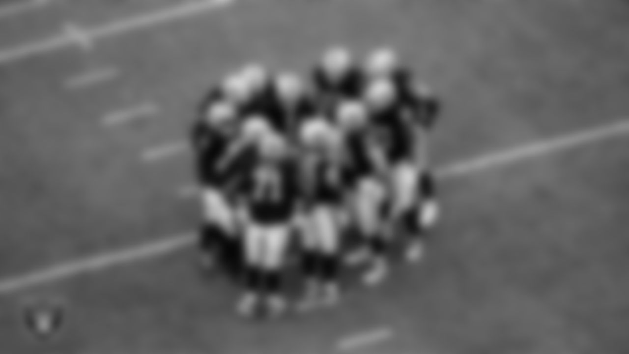The Las Vegas Raiders huddle during the preseason home game against the San Francisco 49ers at Allegiant Stadium.