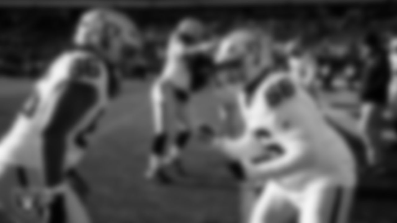 Las Vegas Raiders guard Dylan Parham (66) and guard Atonio Mafi (56) warming up before the regular season away game against the Philadelphia Eagles at Lincoln Financial Field.