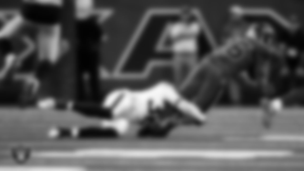 Las Vegas Raiders safety Lonnie Johnson Jr. (32) makes a tackle during the regular season away game against the Houston Texans at NRG Stadium.
