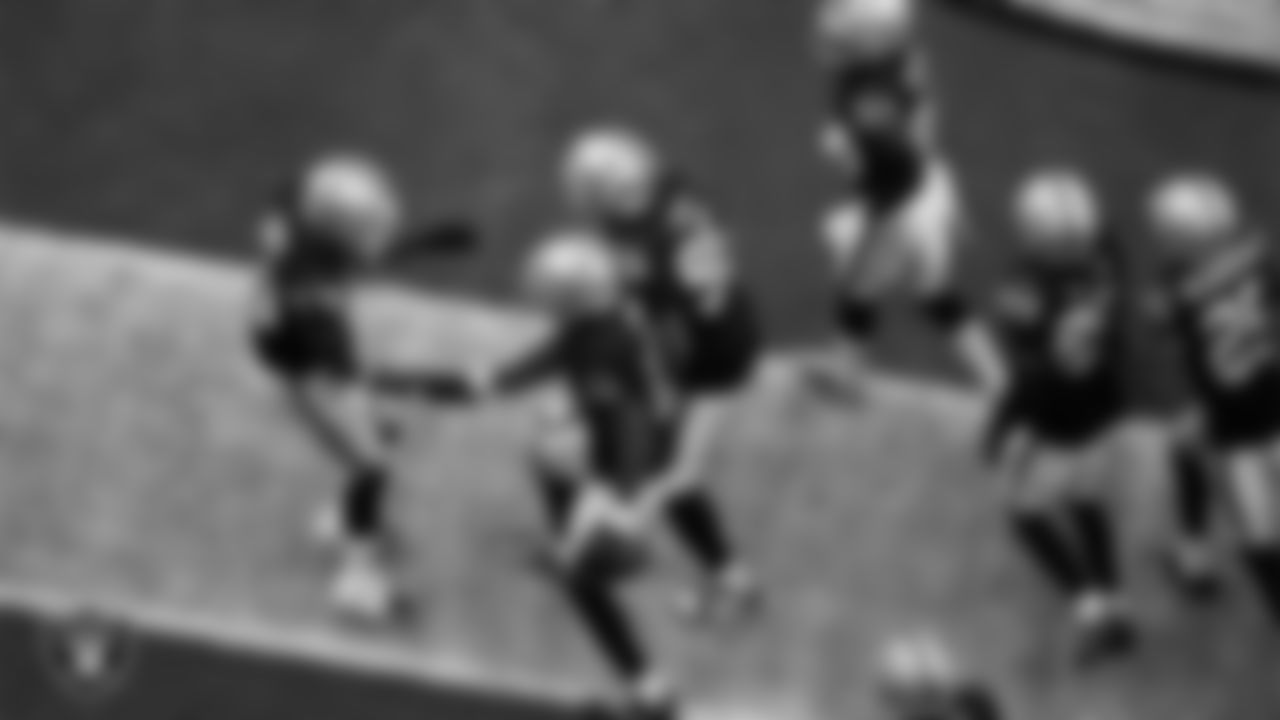 Las Vegas Raiders safety Jeremy Chinn (11) celebrates with teammates after intercepting a pass during the preseason home game against the San Francisco 49ers at Allegiant Stadium.