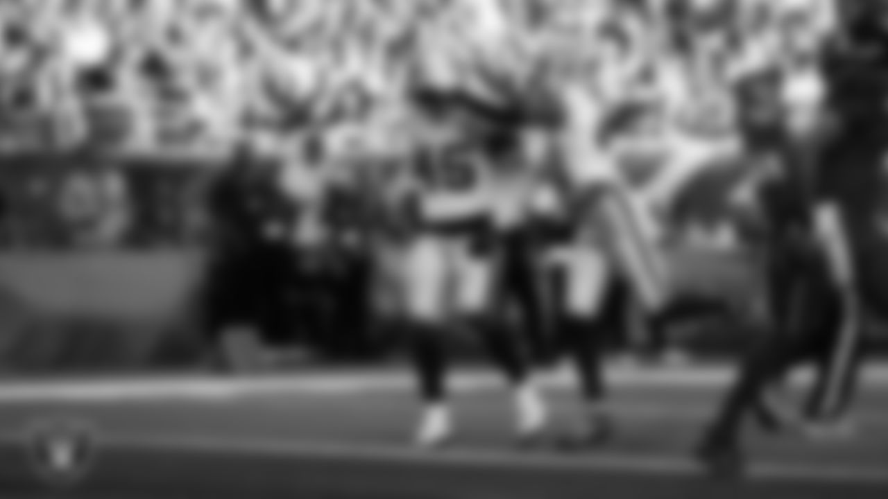 Las Vegas Raiders linebacker Devin White (45) celebrates with cornerback Greedy Vance (41) after making a tackle during the regular season away game against the Houston Texans at NRG Stadium.