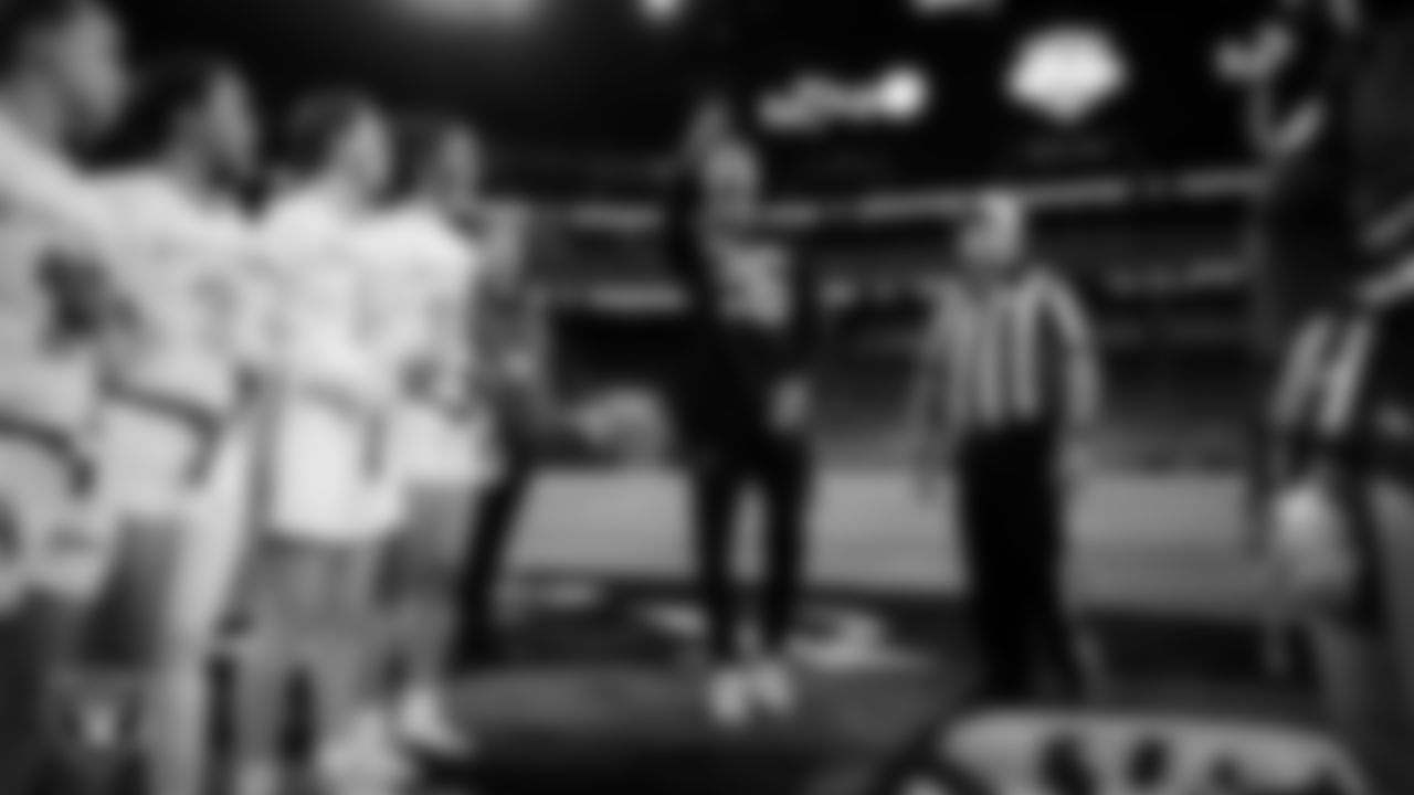 Las Vegas Raiders cornerback Darien Porter (26) during the coin toss before the NIAA 5A Flag Football State Championship game between Shadow Ridge High School and Bishop Gorman High School at Allegiant Stadium.