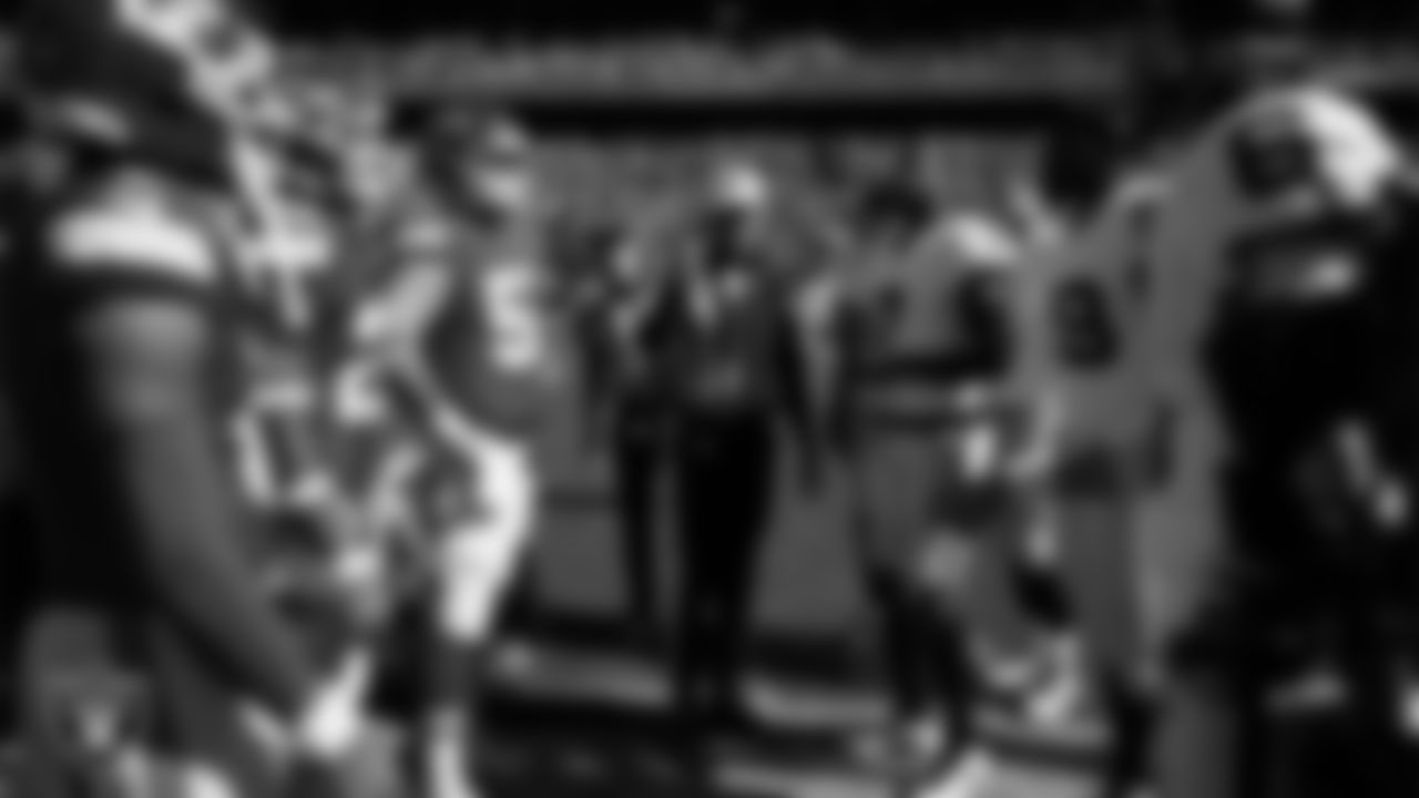 The Las Vegas Raiders during the coin toss before the regular season away game against the Kansas City Chiefs at GEHA Field at Arrowhead Stadium.
