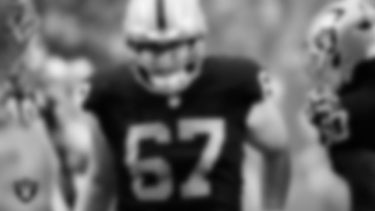 Las Vegas Raiders center Will Putnam (67) is introduced onto the field before the regular season home game against the Cleveland Browns at Allegiant Stadium.