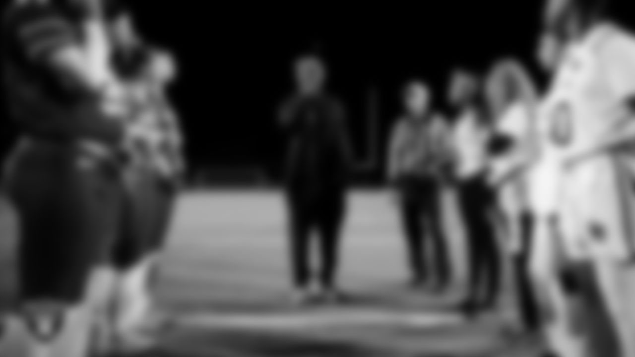Las Vegas Raiders alumnus Bene Benwikere during the coin toss before the Raiders' High School Flag Football Showcase game between Green Valley High School and Del Sol Academy of the Performing Arts at Green Valley High School.