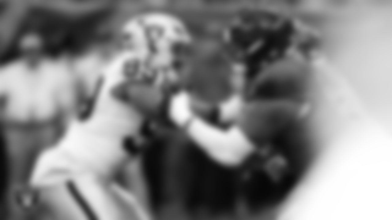 Las Vegas Raiders defensive tackle Thomas Booker IV (99) defends during the regular season away game against the Houston Texans at NRG Stadium.