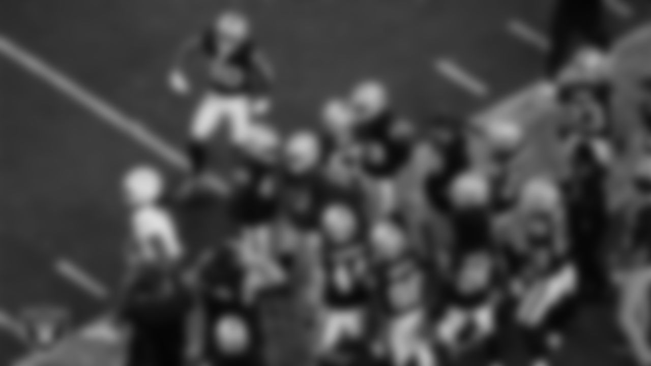 Las Vegas Raiders cornerback Eric Stokes (22) celebrates with teammates after breaking up a pass during the regular season home game against the Los Angeles Chargers at Allegiant Stadium.