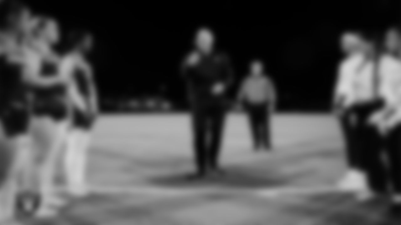 Las Vegas Raiders alumnus Jay Schroeder during the coin toss before the Las Vegas Raiders' High School Flag Football Showcase game between Bonanza High School and Amplus Academy at Bonanza High School.