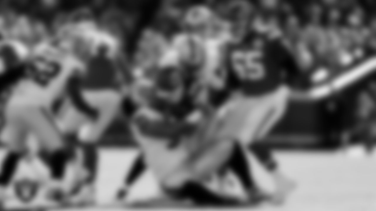 Las Vegas Raiders defensive tackle Leki Fotu (95) and defensive end Malcolm Koonce (51) during the regular season away game against the Kansas City Chiefs at GEHA Field at Arrowhead Stadium.