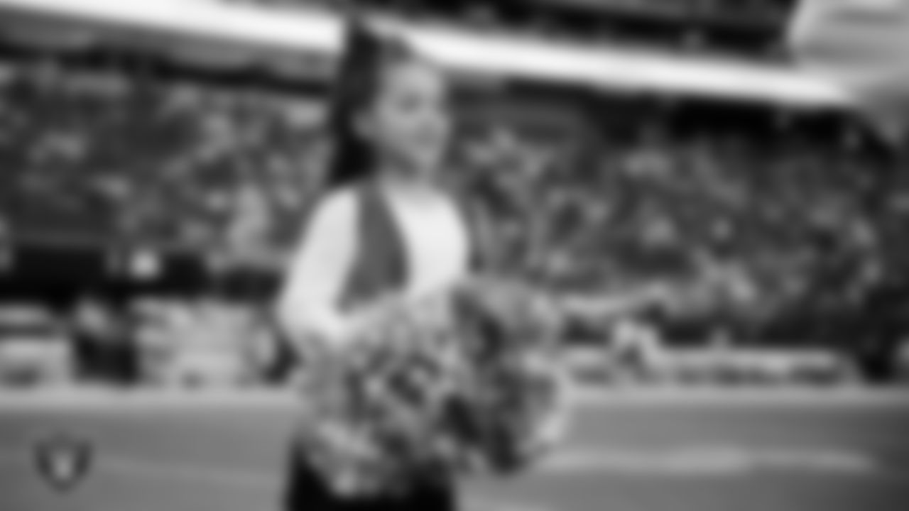 Junior Raiderettes perform on the field before the preseason home game against the San Francisco 49ers at Allegiant Stadium.