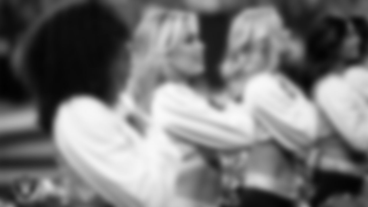 Raiderette Devyn during the national anthem before the regular season home game against the Los Angeles Chargers at Allegiant Stadium.