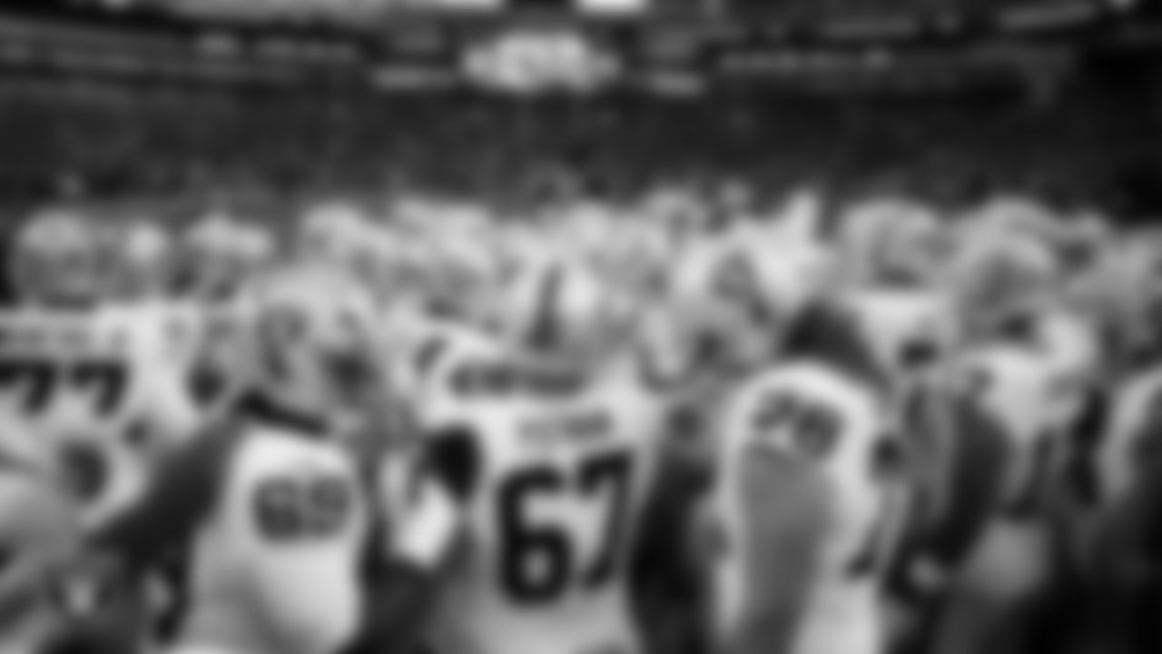 The Las Vegas Raiders huddle before the preseason away game against the Seattle Seahawks at Lumen Field.
