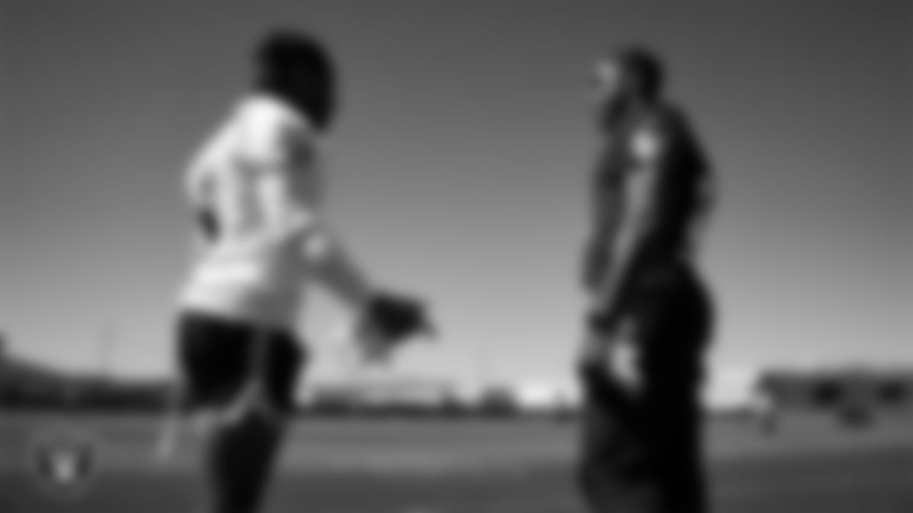 Las Vegas Raiders wide receiver Tre Tucker (1) and cornerback Jakorian Bennett (0) at a workout during phase two of the offseason program at Intermountain Health Performance Center.