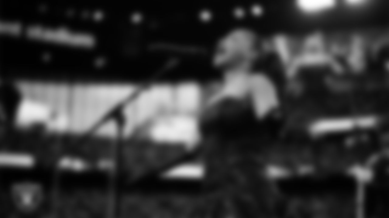 Singer Stephani Parker performs the national anthem before the Las Vegas Raiders' regular season home game against the Chicago Bears at Allegiant Stadium.