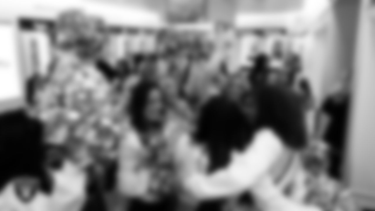 Raiderette Makenna is named Raiderette of the Game in the locker room before the regular season home game against the Cleveland Browns at Allegiant Stadium.